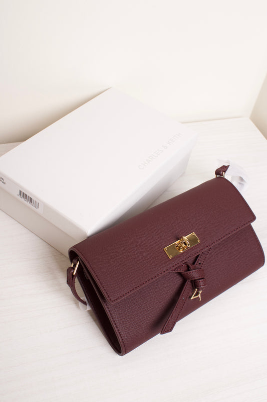 Tricha Knotted-Belt Crossbody Bag - Wineberry Red