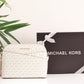 Jet Set Travel Medium Logo Dome Crossbody Bag - VANILLA