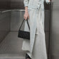 Ivette Woven Elongated Shoulder Bag - Noir